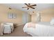 Bright bedroom featuring a comfortable bed, plush carpet, and natural light at 2228 Swedish Dr # 22, Clearwater, FL 33763