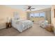 Bright bedroom featuring a comfortable bed, plush carpet, and natural light at 2228 Swedish Dr # 22, Clearwater, FL 33763