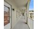 Exterior hallway featuring an open design with gray paint and black lighting at 2228 Swedish Dr # 22, Clearwater, FL 33763
