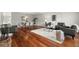 Open-concept living area with hardwood floors, neutral decor, and ample natural light at 2228 Swedish Dr # 22, Clearwater, FL 33763