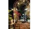 Beautiful outdoor space with potted plants, spiral staircase, and ornate metal decorations and arches at 246 22Nd Ne Ave, St Petersburg, FL 33704
