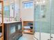 Modern bathroom with a glass-enclosed shower, sleek vanity, and contemporary fixtures, offering a spa-like experience at 246 22Nd Ne Ave, St Petersburg, FL 33704