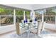 Bright dining room with glass table, seating for six, and lots of natural light at 246 22Nd Ne Ave, St Petersburg, FL 33704