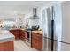 Updated kitchen features stainless steel appliances, wood countertops, and ample cabinet space at 246 22Nd Ne Ave, St Petersburg, FL 33704