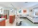 Open concept living area, hardwood floors, neutral decor, and stainless steel appliances at 246 22Nd Ne Ave, St Petersburg, FL 33704
