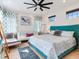 Stylishly designed main bedroom featuring a comfortable bed, chic furnishings, and ample natural light, creating a relaxing retreat at 246 22Nd Ne Ave, St Petersburg, FL 33704