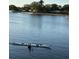 Picturesque water view featuring a sleek kayak gliding through calm waters on a sunny day at 246 22Nd Ne Ave, St Petersburg, FL 33704