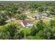 High angle view of a home nestled within a mature trees at 2512 Rustic Oaks Dr, Lutz, FL 33559