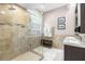 Bathroom featuring a glass shower and modern hardware at 2512 Rustic Oaks Dr, Lutz, FL 33559