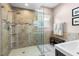 Modern bathroom with a glass enclosed shower and stylish fixtures at 2512 Rustic Oaks Dr, Lutz, FL 33559