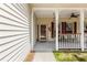 Charming front porch with a welcoming entrance at 2512 Rustic Oaks Dr, Lutz, FL 33559