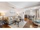 Inviting living room with hardwood floors, comfortable seating, and elegant decor at 2512 Rustic Oaks Dr, Lutz, FL 33559