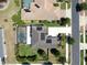 Aerial view showcases the home's solar panels, pool, patio and landscaping at 2517 Cumberland Cliff Dr, Ruskin, FL 33570