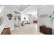 Open and airy entryway leading into dining and living area with views to the rest of the home at 2517 Cumberland Cliff Dr, Ruskin, FL 33570