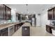 Spacious kitchen with stainless steel appliances, granite countertops, and center island at 2517 Cumberland Cliff Dr, Ruskin, FL 33570
