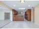 Open floor plan with tiled floors flowing to the kitchen perfect for entertaining friends and Gathering at 2675 Firestone Dr, Clearwater, FL 33761