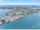 Aerial view of waterfront home located on a peninsula with stunning views at 326 176Th Avenue Cir, Redington Shores, FL 33708