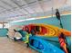 Storage Room for all the toys, including stand up paddle boards, kayaks, paddles, and life vests, at this waterfront retreat at 326 176Th Avenue Cir, Redington Shores, FL 33708