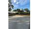 Outdoor basketball court with a hoop and plenty of room for a game at 3260 Haviland Ct # 202, Palm Harbor, FL 34684
