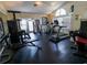 Community gym with natural light and a variety of exercise equipment for residents' fitness needs at 3260 Haviland Ct # 202, Palm Harbor, FL 34684