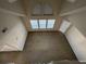 Loft with high ceilings and multiple windows at 3260 Haviland Ct # 202, Palm Harbor, FL 34684