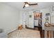 Bedroom showcasing a rocking horse, hardwood floors, and a closet at 3417 W Alline Ave, Tampa, FL 33611