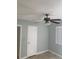 Bedroom features a ceiling fan and light from a window at 3502 E 33Rd Ave, Tampa, FL 33610
