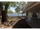 An expansive backyard featuring a patio and lush trees at 3530 Umber Rd, Holiday, FL 34691