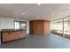 A covered patio featuring a hot tub and ample space for outdoor enjoyment at 3530 Umber Rd, Holiday, FL 34691