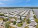 Waterfront community featuring neat landscaping, attractive homes, and a picturesque view of the nearby lake at 3716 Carioca Rd, Holiday, FL 34691