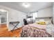 Comfortable bedroom featuring a bed, desk, and closet perfect for relaxation and storage at 3716 Carioca Rd, Holiday, FL 34691