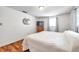 Cozy bedroom with hardwood floors and natural light at 3716 Carioca Rd, Holiday, FL 34691