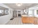 Spacious kitchen with stainless steel appliances and ample cabinet space at 3716 Carioca Rd, Holiday, FL 34691