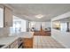 Open-concept living area with natural light and neutral color palette at 3716 Carioca Rd, Holiday, FL 34691