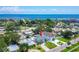 Coastal home with manicured lawn and mature landscaping at 3801 Huntington Ne St, St Petersburg, FL 33703