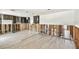 Spacious kitchen with sleek flooring, modern cabinetry, and ample room for customization and design at 3801 Huntington Ne St, St Petersburg, FL 33703
