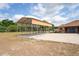 Detached metal carport on a concrete pad with plenty of room to park at 39427 Comstock Ln, Zephyrhills, FL 33540
