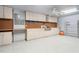 Garage featuring ample storage, built in cabinets and room for a workshop at 39427 Comstock Ln, Zephyrhills, FL 33540