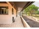 Spacious covered patio with brick pavers providing serene outdoor living at 39427 Comstock Ln, Zephyrhills, FL 33540