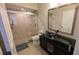 Bathroom featuring a glass shower, updated vanity, and neutral finishes at 4872 Silverthorne Ct, Oldsmar, FL 34677