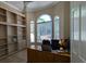 Bright office space boasting beautiful built-in shelving and windows at 4872 Silverthorne Ct, Oldsmar, FL 34677