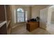 Bright office featuring large windows and built in shelving at 4872 Silverthorne Ct, Oldsmar, FL 34677