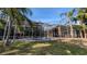 This home features a stunning screened-in pool area, perfect for relaxation and outdoor entertainment at 4872 Silverthorne Ct, Oldsmar, FL 34677