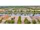 Waterfront homes boast scenic views and well-manicured lawns in this peaceful neighborhood at 4949 Marble Springs Cir, Wimauma, FL 33598