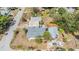 Aerial view of a residential neighborhood; home has detached two car garage and fenced yard at 5101 13Th S Ave, Gulfport, FL 33707