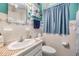 Bathroom featuring patterned tile and decor giving the room a beach vibe at 5101 13Th S Ave, Gulfport, FL 33707