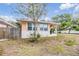 Charming home exterior with a front porch, showcasing classic curb appeal and a welcoming entrance at 5101 13Th S Ave, Gulfport, FL 33707
