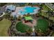 Aerial view of community amenities including pool, playground and lounging area at 5437 Del Coronado Dr, Apollo Beach, FL 33572