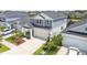 Well maintained two-story home with a two-car garage, nicely landscaped front yard and manicured lawn at 5437 Del Coronado Dr, Apollo Beach, FL 33572