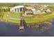 Aerial view of community with recreation center, pool, dock, and serene waterfront views at 5437 Del Coronado Dr, Apollo Beach, FL 33572